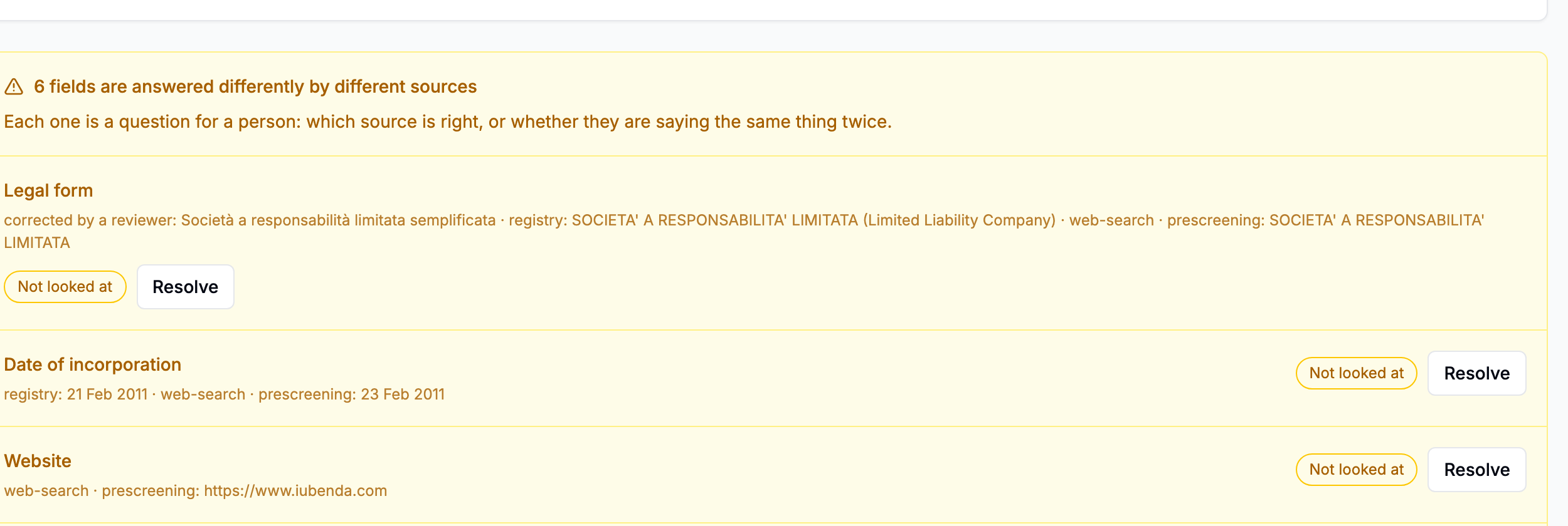 The Disagreements panel at the top of the Fields tab, one row per disputed field with a Resolve action